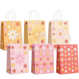 Set of six floral-patterned paper bags in yellow, pink, and red on a white background.