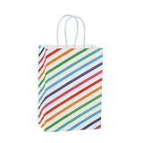 Paper gift bag with colorful diagonal stripes on a white background