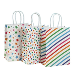Three colorful paper bags with star, polka dot, and striped patterns on a white background.